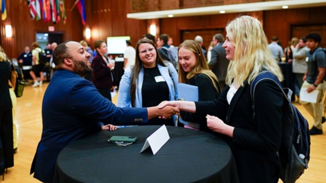 Cole McGinnis with students